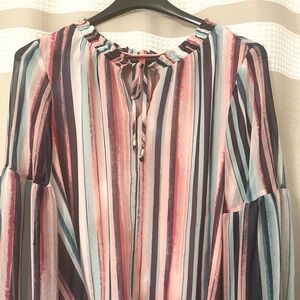 Jennifer Lopez flowing dress shirt